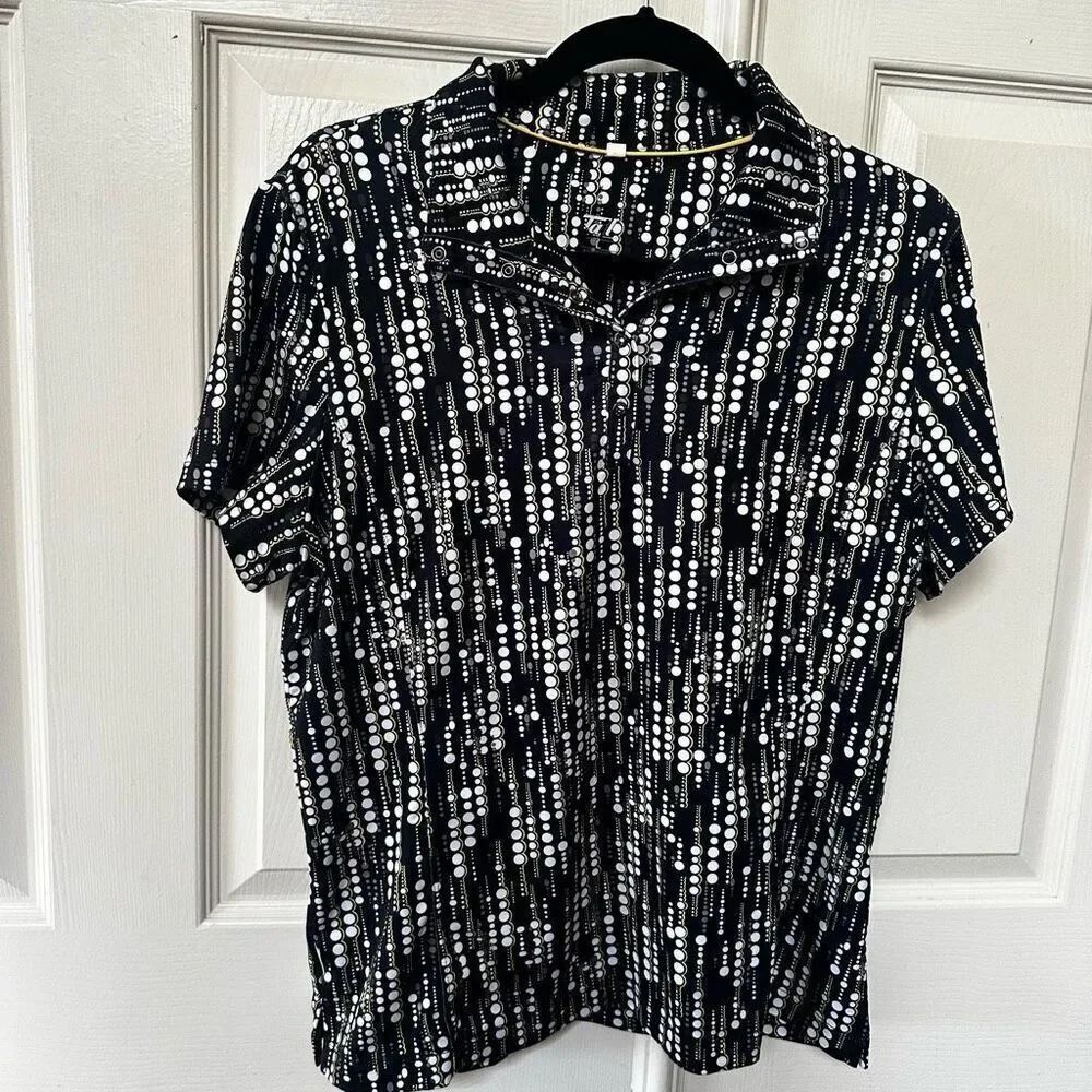 Tail black, yellow  and white short sleeved golf shirt